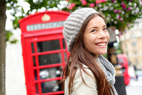 Photo: London people - woman by red phone booth London people - woman by red phone booth