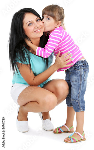 Photo: Mom and daughter together isolated on white Mom and daughter together isolated on white