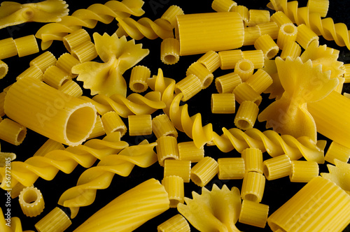 Photo: Pasta on black background Pasta on black background