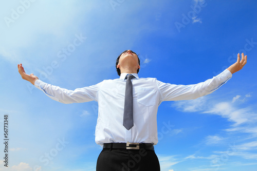 Photo: carefree business man arms up carefree business man arms up