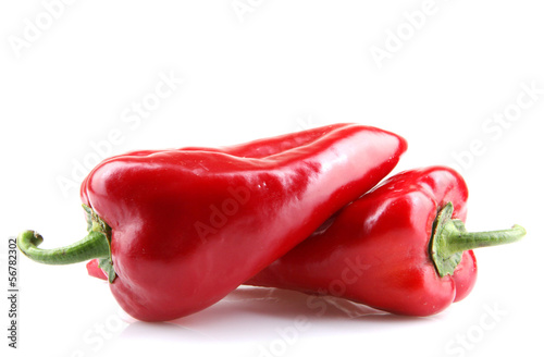 Photo: Red Chilli Peppers On White Background Red Chilli Peppers On White Background