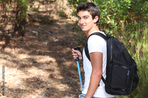 Photo: Young brunette with knapsack Young brunette with knapsack