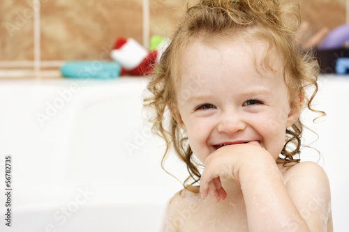 Photo: Little toddler enjoying bathing Little toddler enjoying bathing