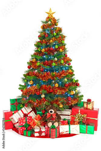 Photo: Christmas tree and presents isolated on white Christmas tree and presents isolated on white