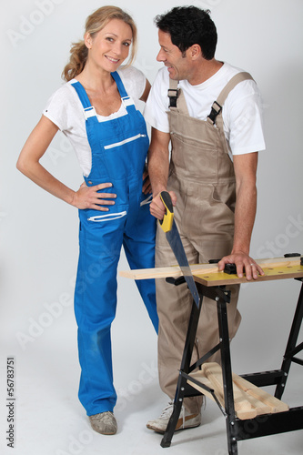 Photo: couple tinkering couple tinkering