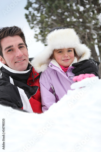 Photo: Father and daughter in the snow Father and daughter in the snow