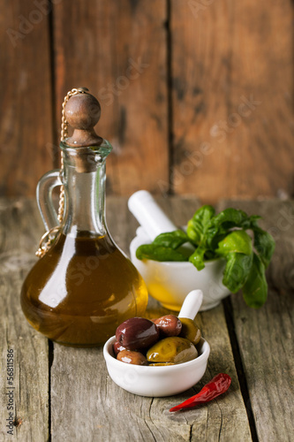 Photo: Olive oil with olives and basil Olive oil with olives and basil