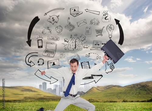 Photo: Cheerful jumping businessman with his suitcase Cheerful jumping businessman with his suitcase