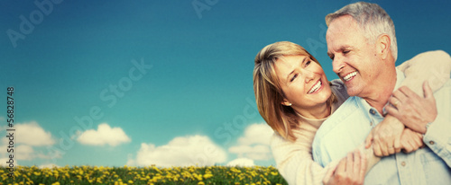 Photo: Old people over sky background Old people over sky background