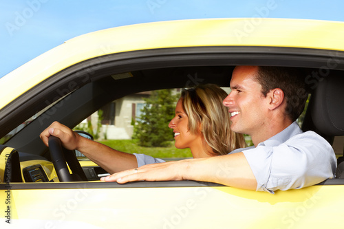 Photo: Couple in the car. Couple in the car.