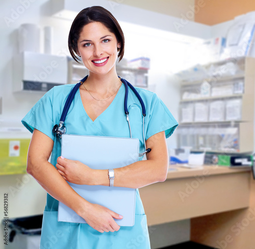 Photo: Pharmacist woman. Pharmacist woman.