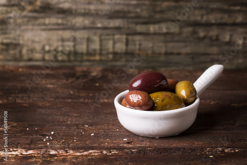 Photo: White bowl of olives White bowl of olives