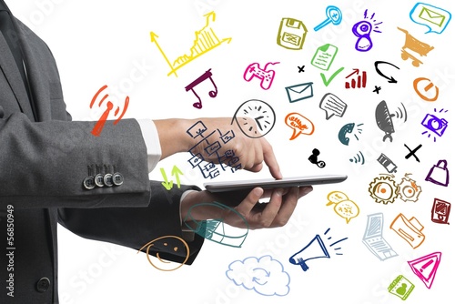 Photo: Businessman working with tablet and social media Businessman working with tablet and social media