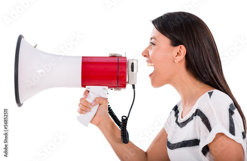 Photo: Woman yelling through a loudspeaker Woman yelling through a loudspeaker