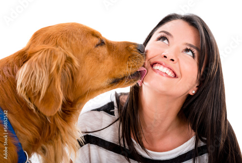 Photo: Dog kissing a woman Dog kissing a woman