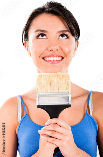 Photo: Thoughtful woman painting Thoughtful woman painting