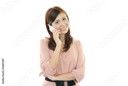Photo: スマートフォンを持つ女性 スマートフォンを持つ女性