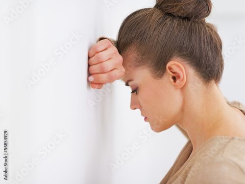 Photo: Portrait of stressed young housewife Portrait of stressed young housewife