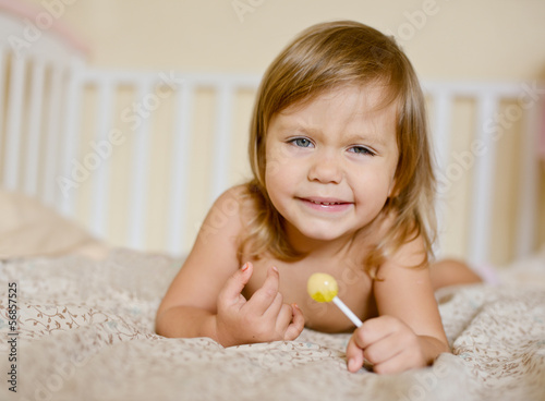 Photo: toddler with lollypop toddler with lollypop