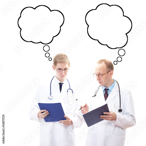 Photo: Male physicians thinking about solution Male physicians thinking about solution