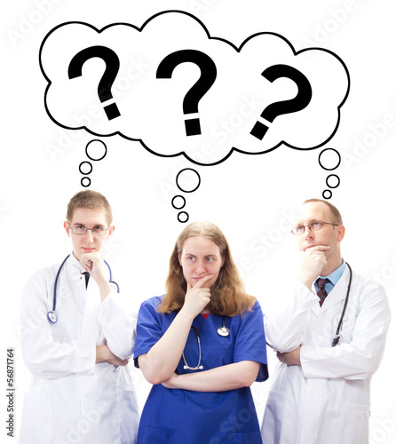 Photo: Team of medical doctors thinking for the perfect solution Team of medical doctors thinking for the perfect solution