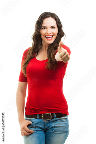 Photo: Happy beautiful woman giving thums up Happy beautiful woman giving thums up