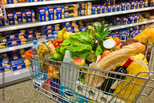 Photo: shopping cart in a supermarket shopping cart in a supermarket