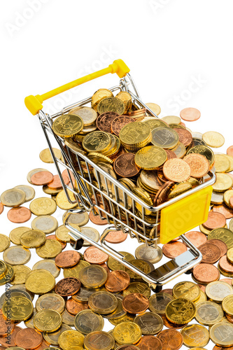 Photo: a shopping cart is filled with well-euro coins a shopping cart is filled with well-euro coins