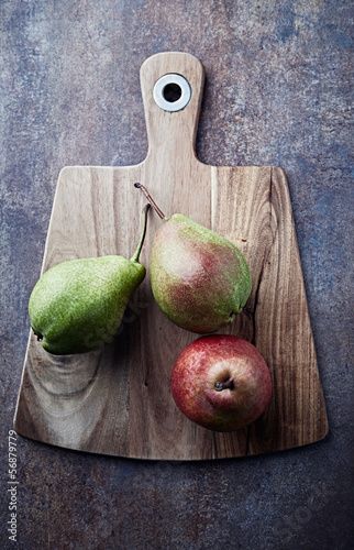 Photo: Still life with pears on a kitchen board Still life with pears on a kitchen board