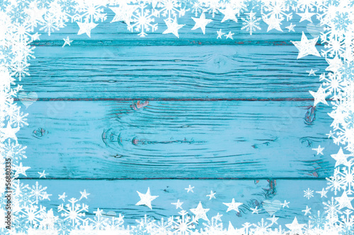 Photo: Weihnachtlicher winterlicher Hintergrund in Türkis mit Rahmen Weihnachtlicher winterlicher Hintergrund in Türkis mit Rahmen