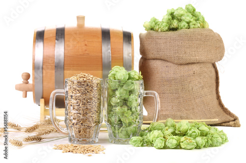 Photo: Two mugs with barley and hop. Two mugs with barley and hop.