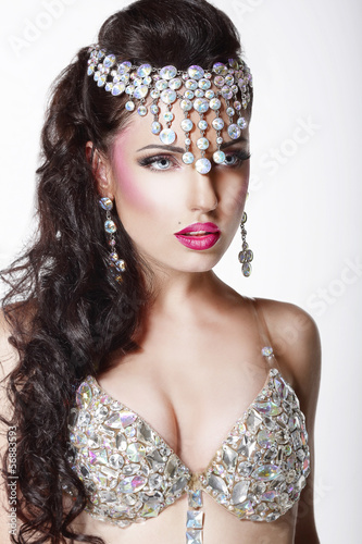 Photo: Luxury. Aristocratic Woman in Glossy Crown with Jewelry Luxury. Aristocratic Woman in Glossy Crown with Jewelry