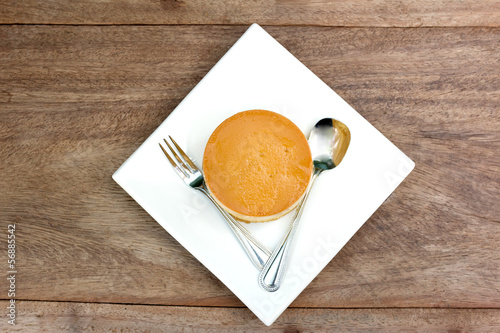 Photo: caramel custard cake on wood background2 caramel custard cake on wood background2