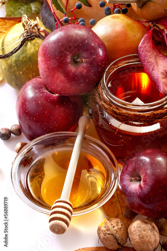 Photo: honey, apples and autumn fruits honey, apples and autumn fruits