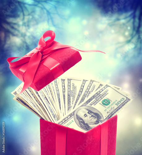 Photo: Hundred dollar bills in the red present box Hundred dollar bills in the red present box