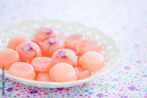 Photo: Homemade sweets with cherry blossom, selective focus Homemade sweets with cherry blossom, selective focus