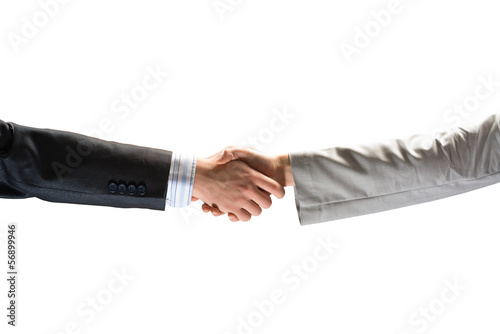 Photo: handshake between two businessmen handshake between two businessmen