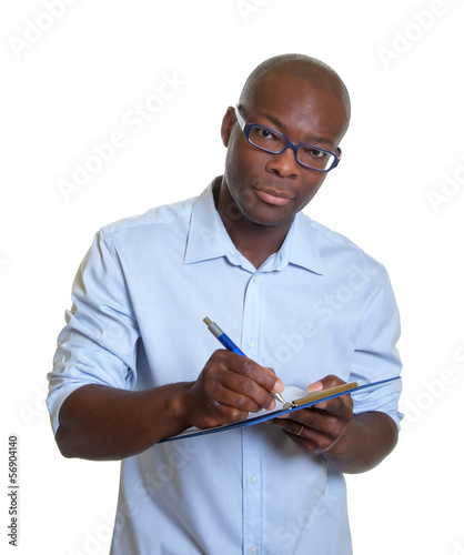 Photo: African businessman with clipboard African businessman with clipboard