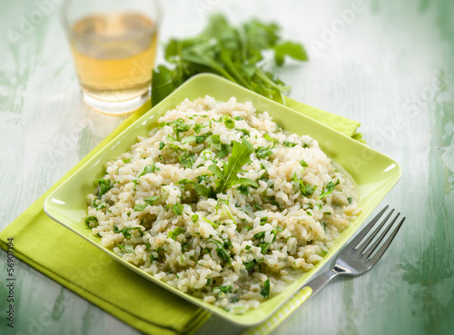 Photo: risotto with arugula, selective focus risotto with arugula, selective focus