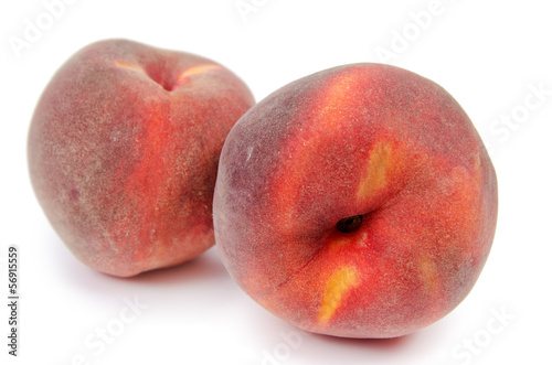 Photo: Close up of a two ripe peaches Close up of a two ripe peaches
