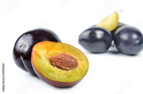 Photo: Red plum fruit isolated on white background Red plum fruit isolated on white background