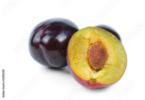 Photo: Fresh plums isolated on white Fresh plums isolated on white