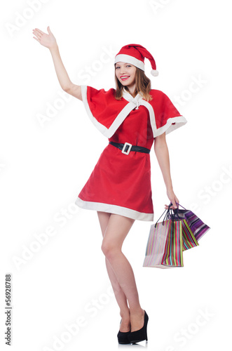 Photo: Young woman in red santa costume on white Young woman in red santa costume on white