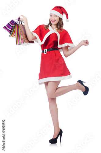 Photo: Young woman in red santa costume on white Young woman in red santa costume on white
