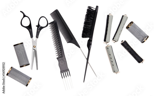 Photo: Professional hairdresser tools isolated on white Professional hairdresser tools isolated on white