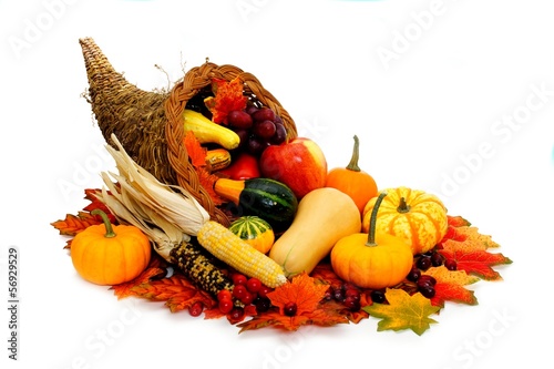 Photo: Harvest or Thanksgiving cornucopia filled with vegetables Harvest or Thanksgiving cornucopia filled with vegetables