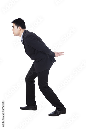 Photo: Businessman carrying something Businessman carrying something