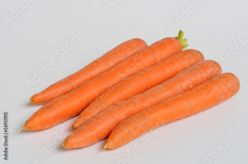 Photo: Carrots in the foreground Carrots in the foreground