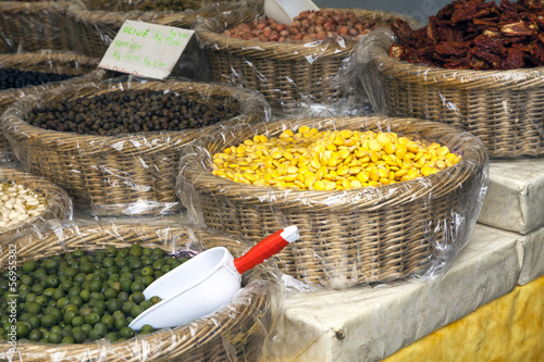 Photo: Olives and cereals on a market stall color image Olives and cereals on a market stall color image