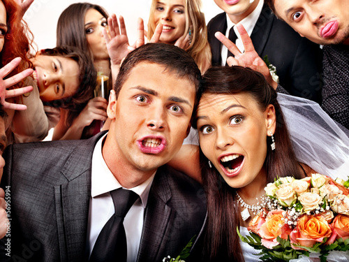 Photo: Bride and groom in photobooth. Bride and groom in photobooth.